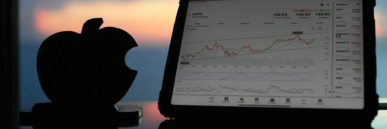 Apple market analysis chart displayed on a screen